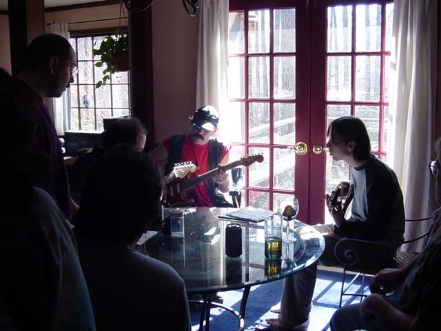 Lou, Matt, Billy and Dave work up a tune around the dining room table